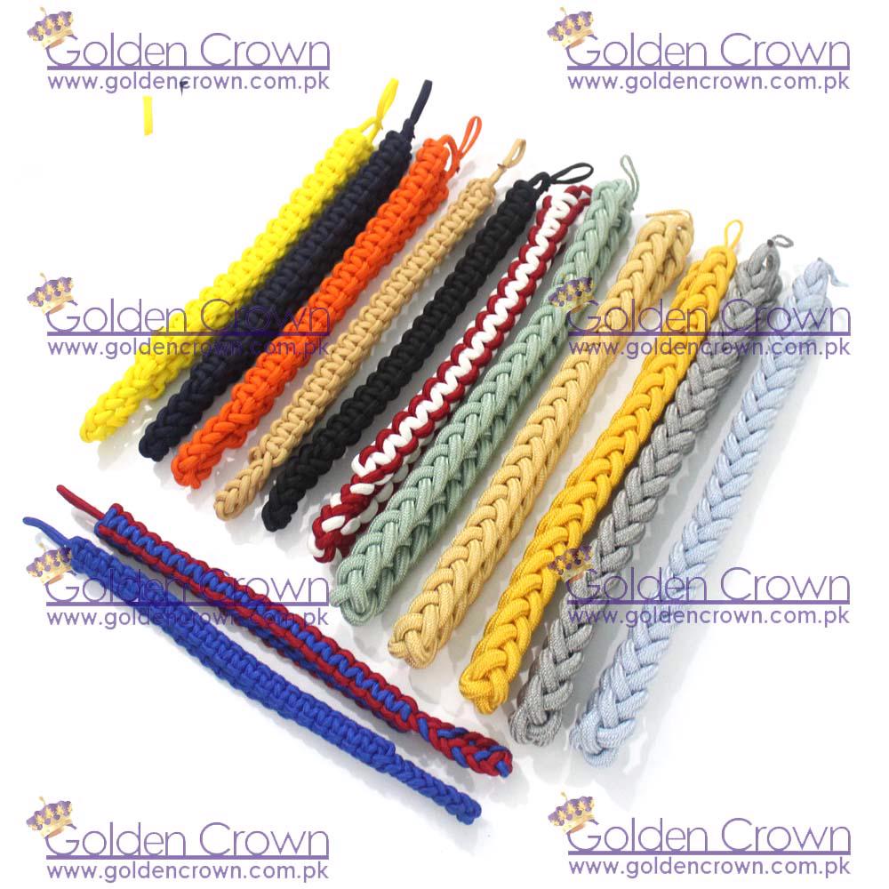 Product image - A military shoulder cord is a braided, decorative cord worn on the shoulder of a military uniform. These cords are often used to signify specific achievements, honors, or assignments within the military. https://goldencrown.com.pk/products/c1095_GROUP-PRODUCTS/i13814_Military-Shoulder-Cord-Braided-Shoulder-Cord-Supplie.aspx
 